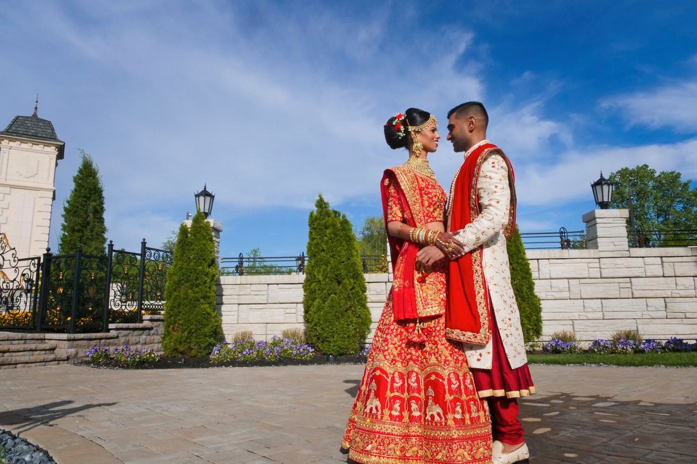 Bride and groom face to face on the terrace at Park Chateau Estate