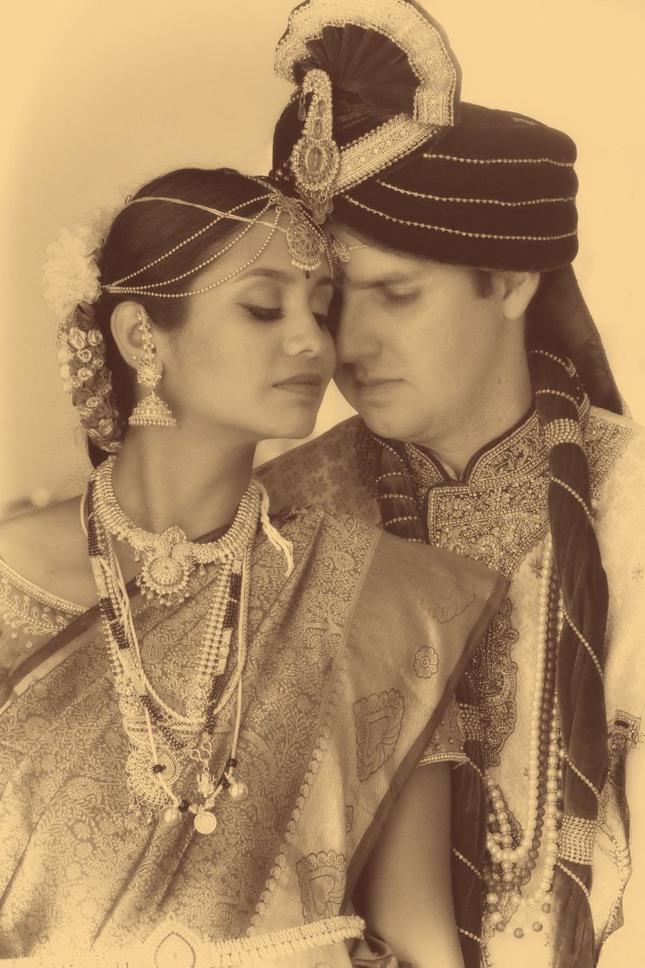 Couple forehead to forehead in sepia