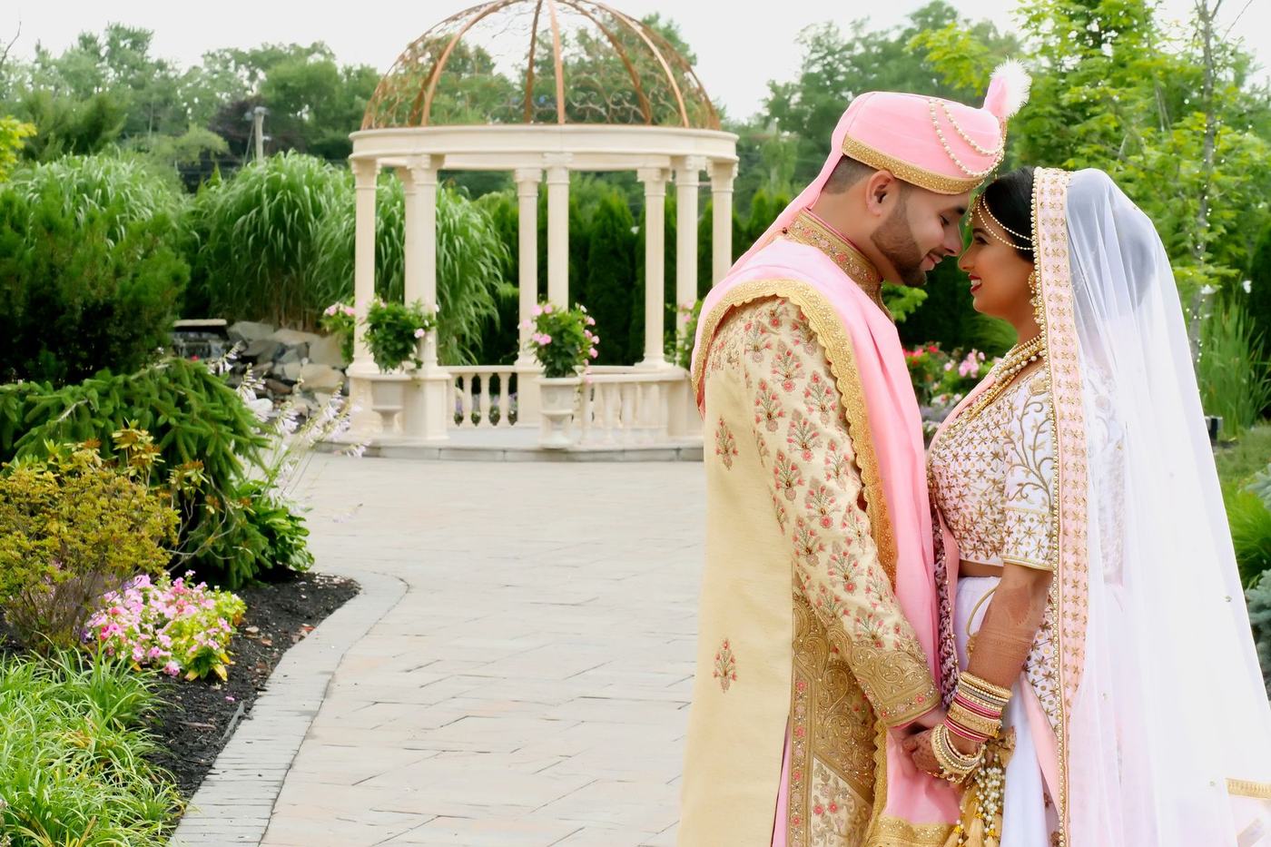 Couple in pink and ivory at The Imperia gazebo, Somerset